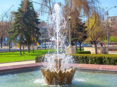 splashing city fountain in the summer