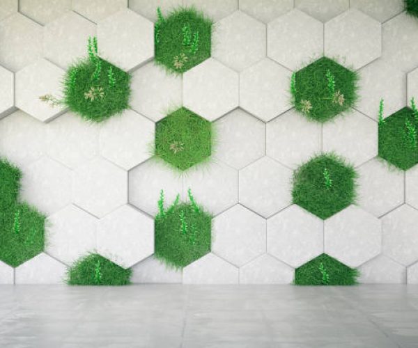 Concrete geometric wall with grass. 3D Render