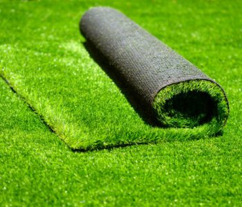 artificial rolled green grass; closeup